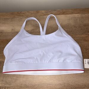lululemon light periwinkle Flow Y mid support sports bra with Red Accent. NWT